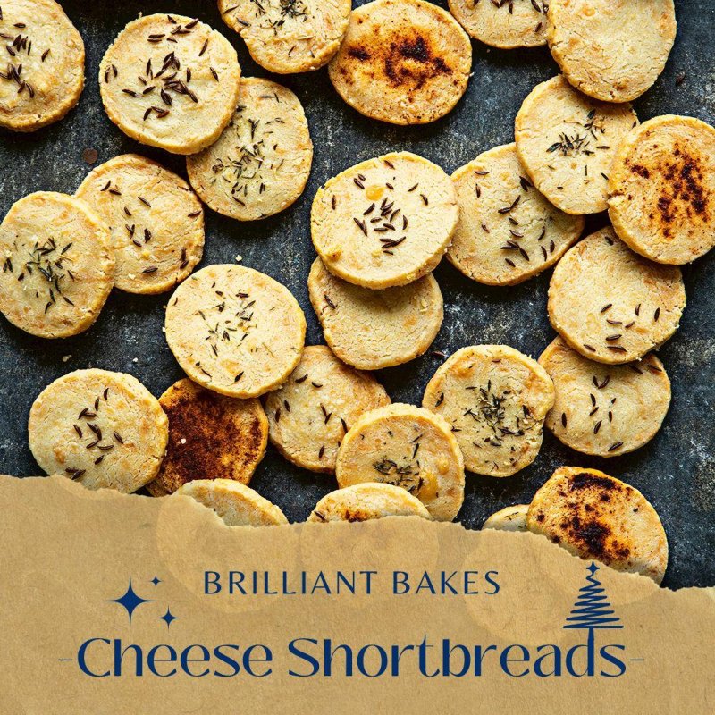 cheese shortbread rounds on a presented on a black tray