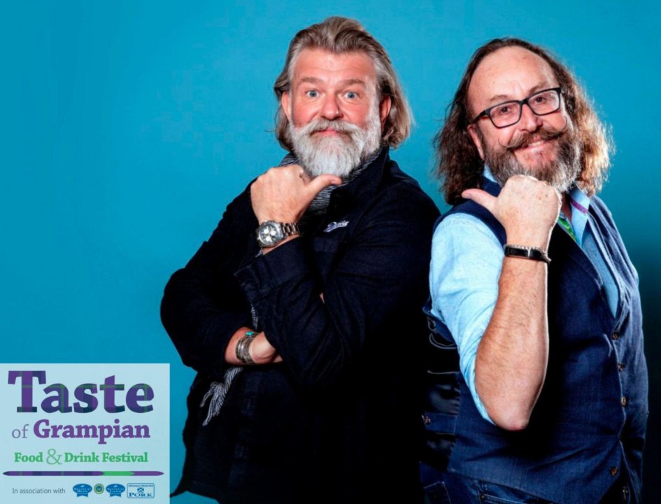 Photograph of the Hairy Bikers, Si King and Dave Myers on a blue background advertising the Taste of Grampian  festival taking place on 4th June 2022.